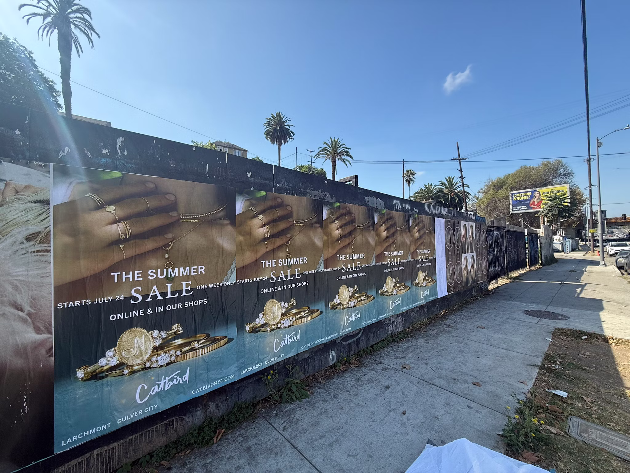 Catbird Summer Sale wild posting at 610 N Alvarado St
