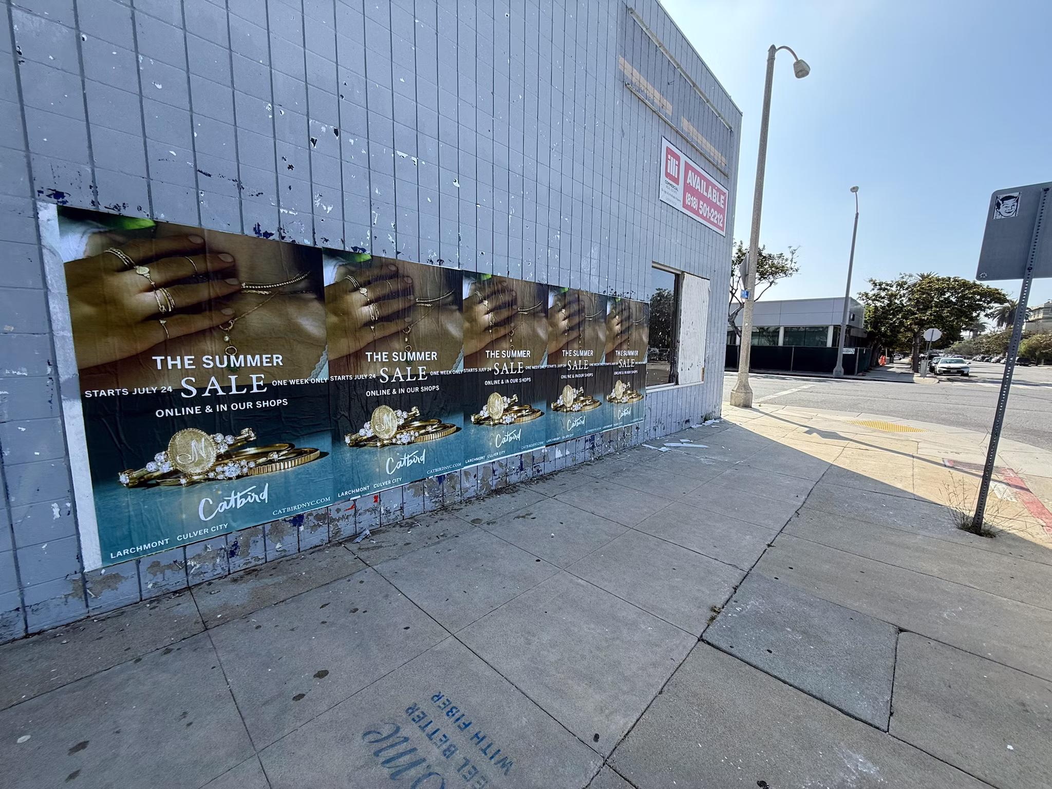 Catbird Summer Sale wild posting at 911 Santa Monica Blvd