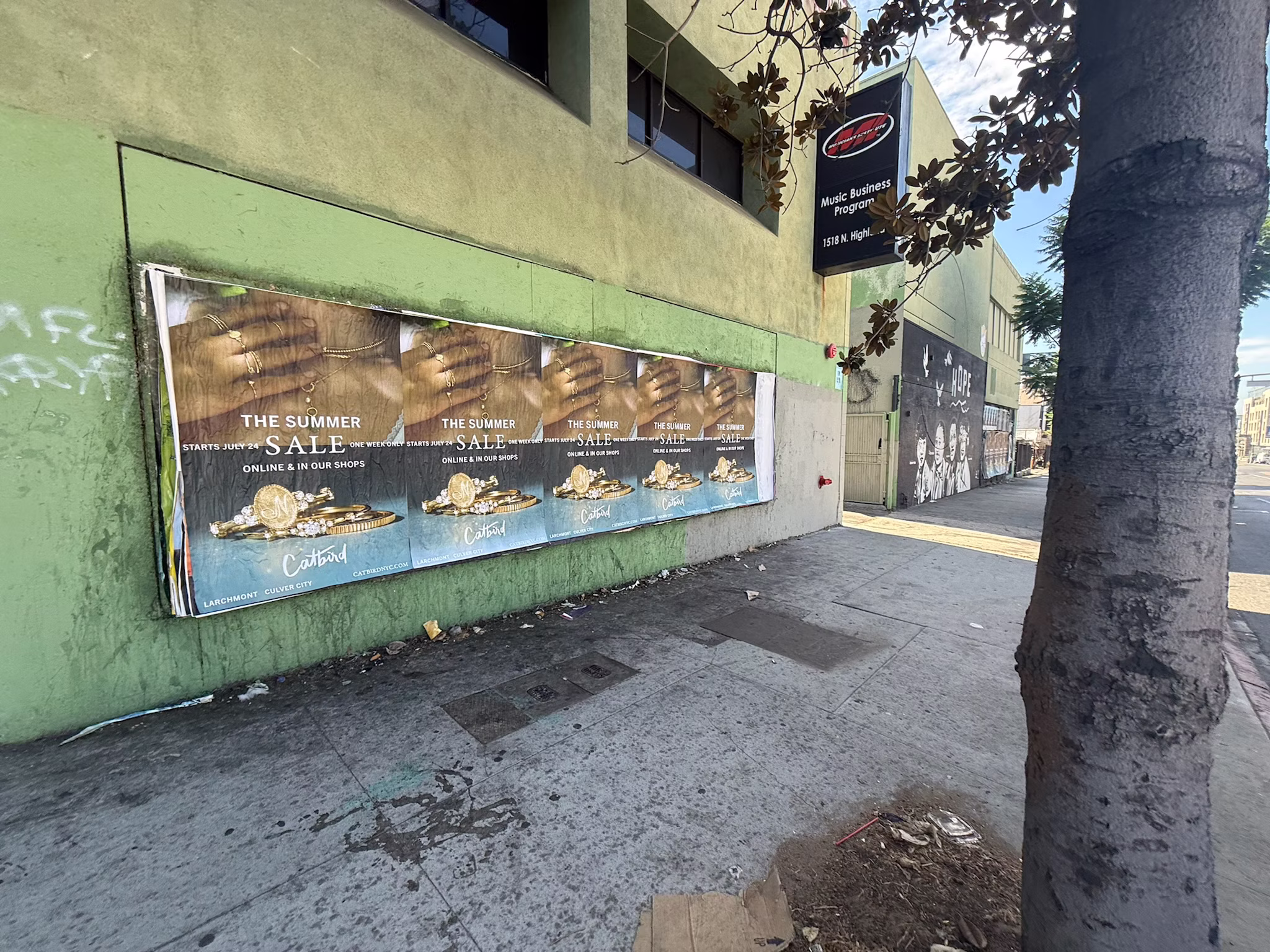 Catbird Summer Sale wild posting at 1518 Highland Ave