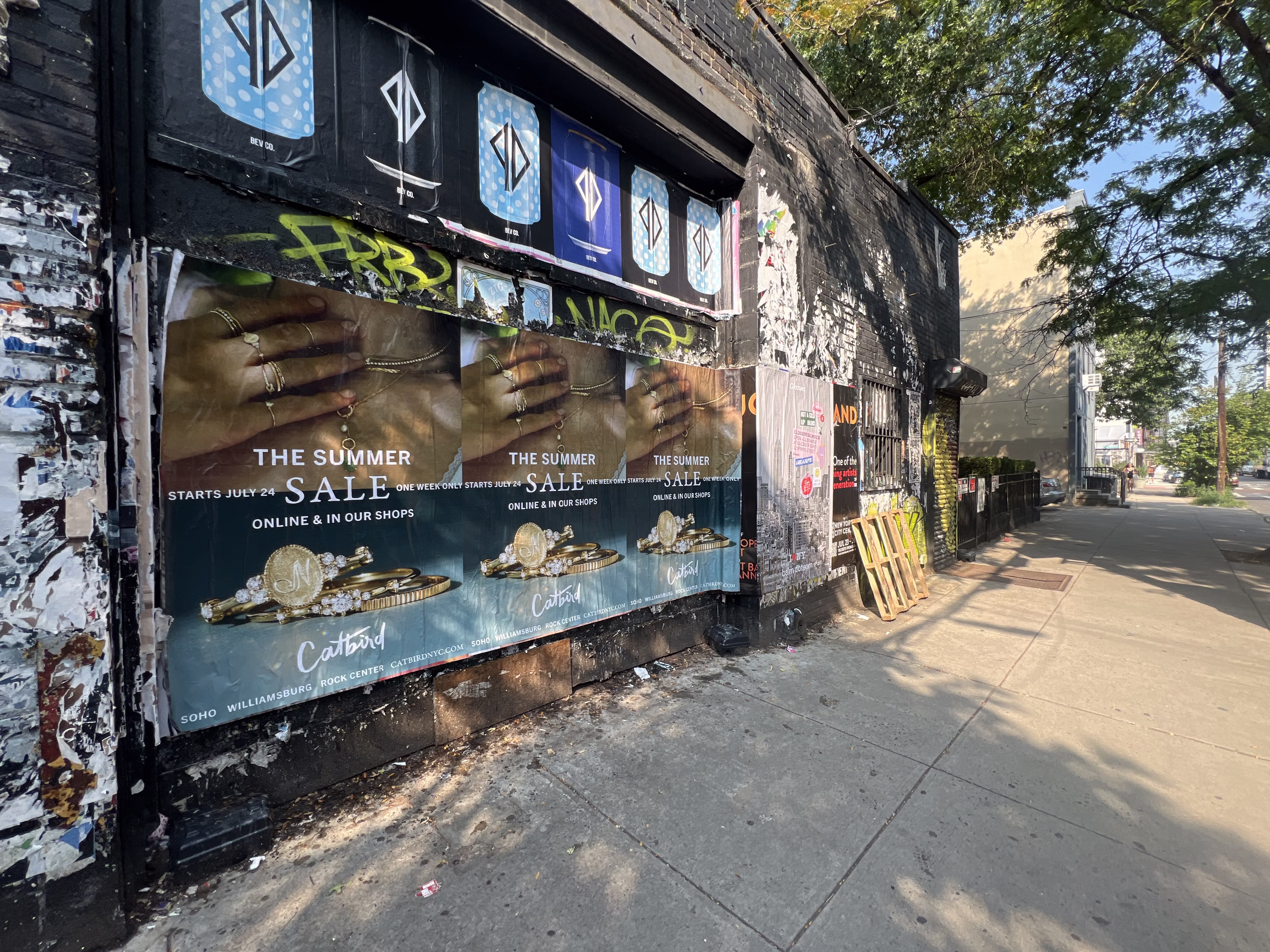 Catbird Summer Sale wild posting at 116 N 5th St