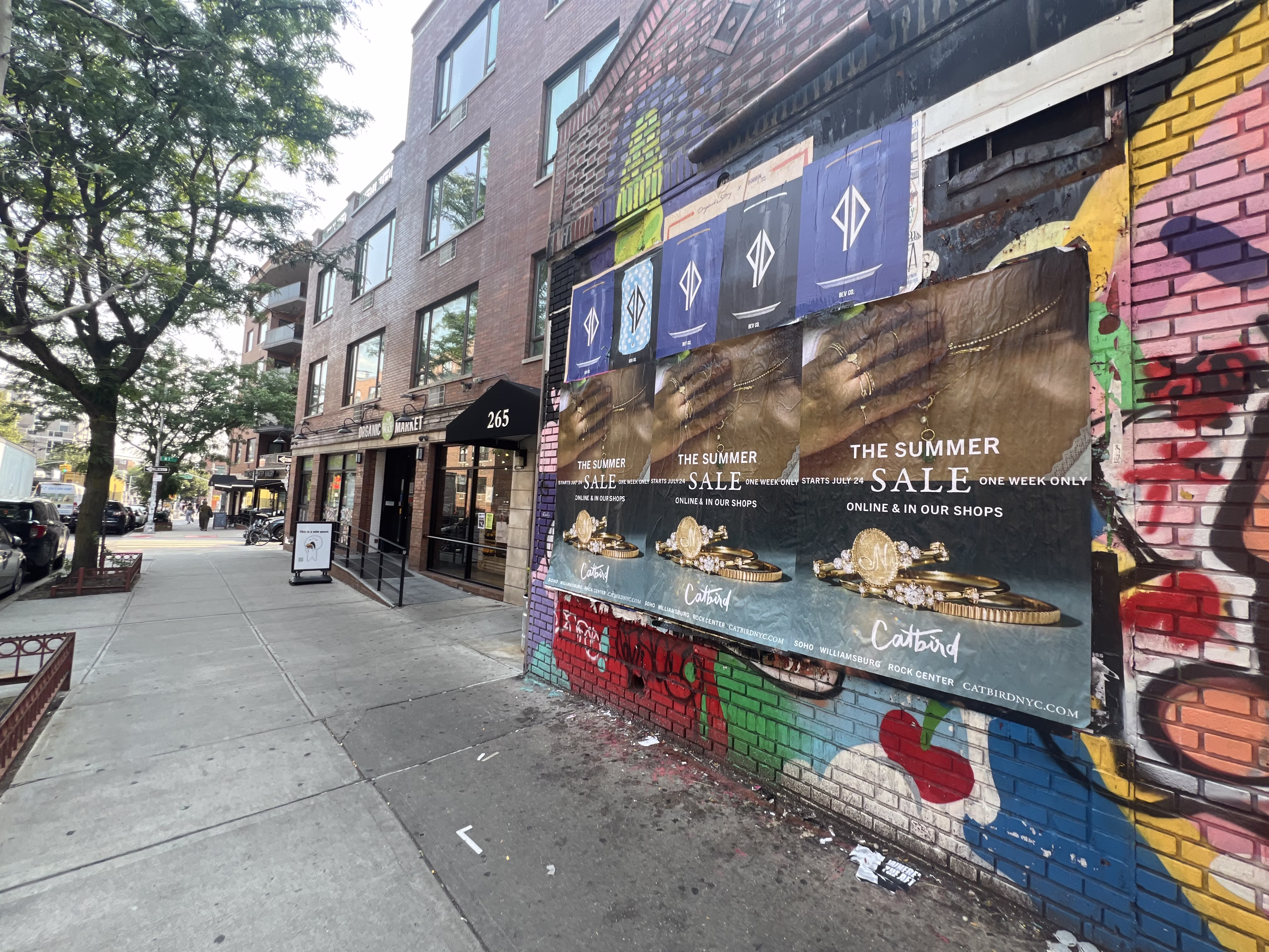 Catbird Summer Sale wild posting at 175 Grand St